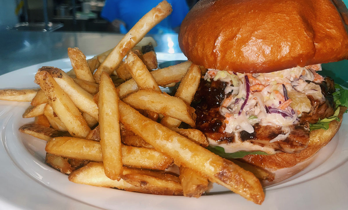 Jerk chicken burger with fries