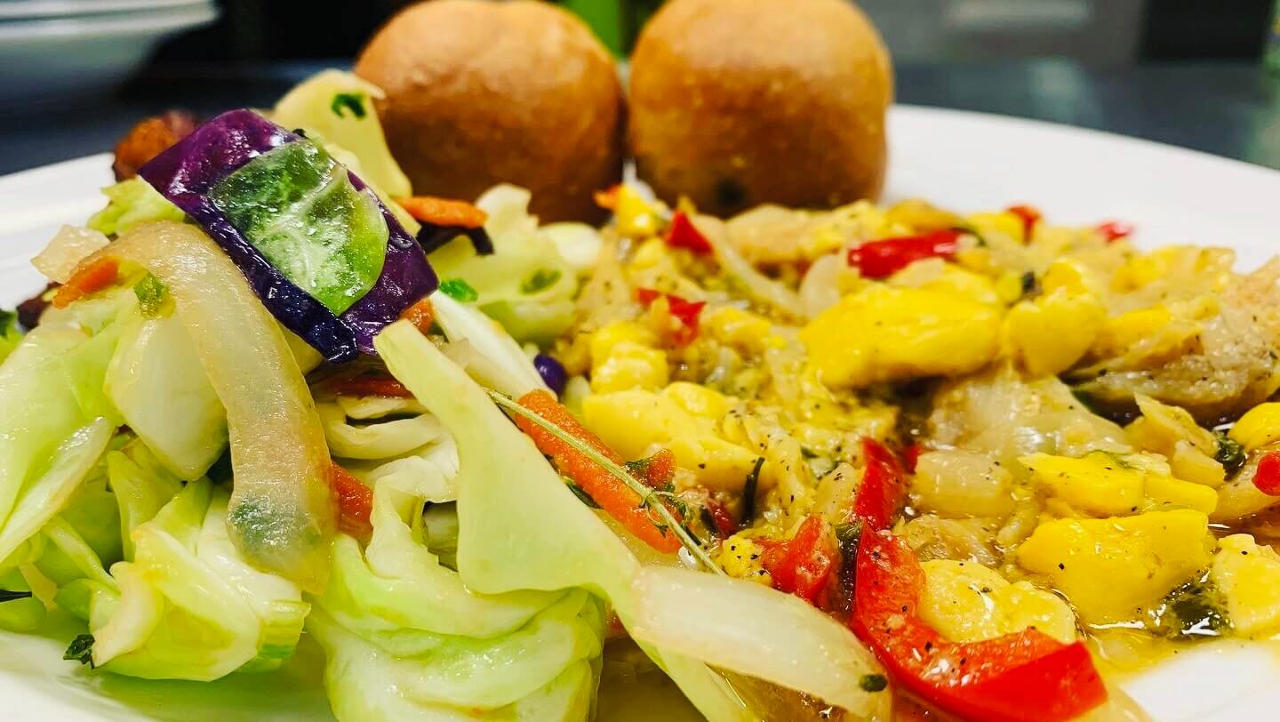 Ackee and saltfish with festival and dumplings